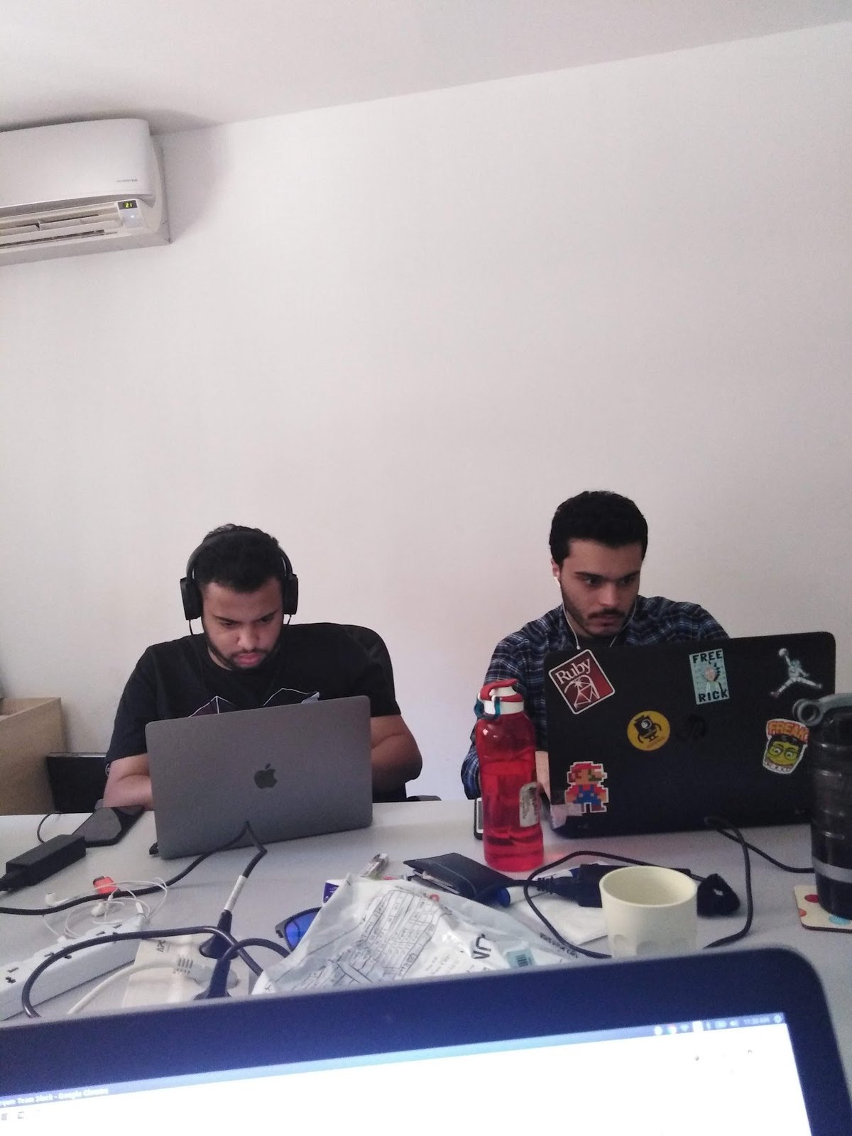 Team members working on Electron app development and DSL implementation